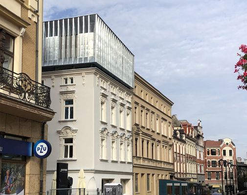 Extension of a historic tenement house Extension of a historic tenement house